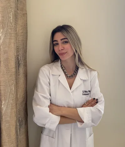 Ms Rita Mansour
